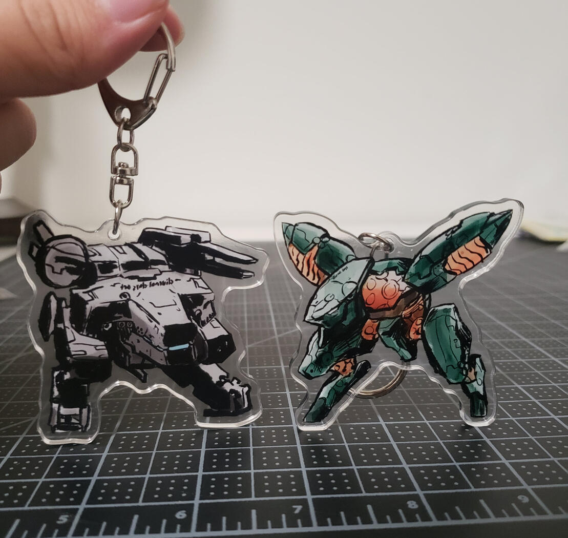 Metal Gear REX and RAY acrylic keychains